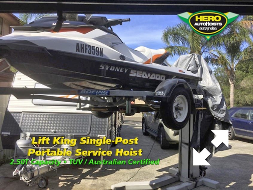 The Lift King Single-Post Portable Service Hoist in action - lifting a jet ski on its trailer...